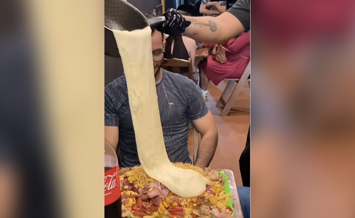 Watch: Man Covers Dish With Liquid Cheese. Internet Calls It “Heart Attack”