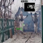 Russian Soldiers Seen Surrendering to Gun-Wielding Robot