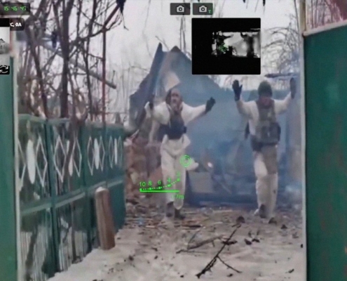 Russian Soldiers Seen Surrendering to Gun-Wielding Robot