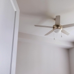 Is your ceiling fan spinning the wrong way? This quick fix will slash your heating costs