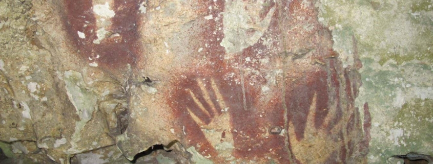 Oldest known rock art is a 68,000-year-old hand stencil with claws