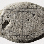 Is this carved rock an ancient Roman board game?