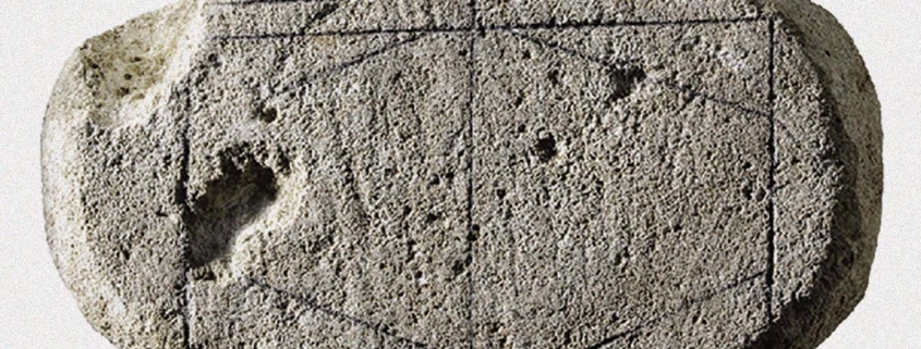 Is this carved rock an ancient Roman board game? Is this carved rock an ancient Roman board game?