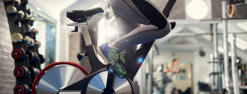 9 Ways You’re Using Your Exercise Bike Wrong, According to Cycling Pros