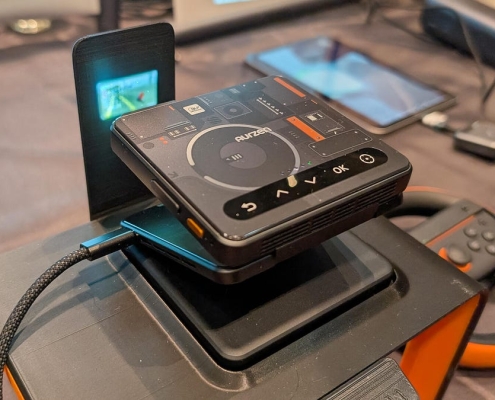 Aurzen’s Zip Foldable Pocket Projector Gets a Cyberpunk-Themed Makeover