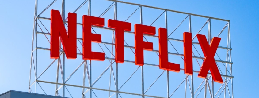 Why did Netflix back down from its deal to acquire Warner Bros.?
