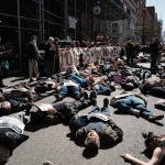 Protesters Stage Unsettling Demonstration in Front of Palantir’s Office
